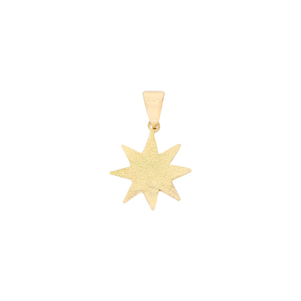 Dije diseño especial motivo estrella en oro amarillo 18 kilates.