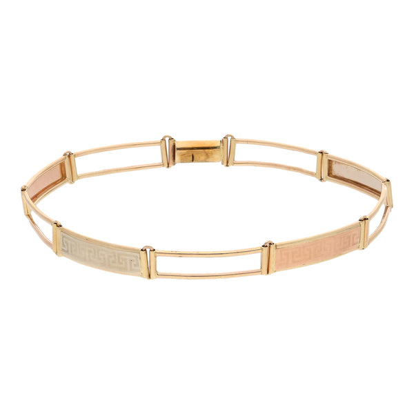 Pulsera eslabón articulado combinado motivo grecas en oro tres tonos 14 kilates.