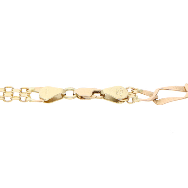 Pulsera eslabón combinado en oro amarillo 14 kilates.