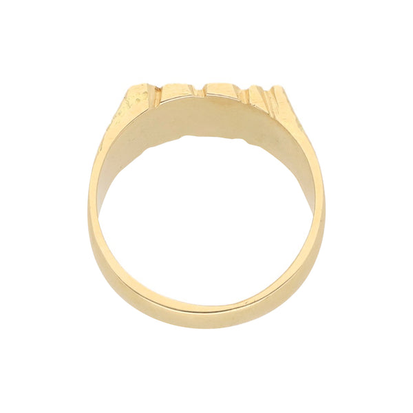 Anillo tipo sello en oro amarillo 18 kilates.