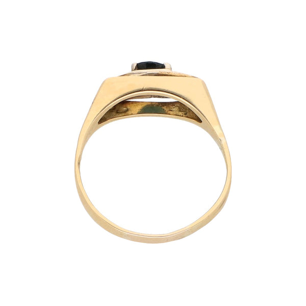 Anillo diseño especial con diamantes y zafiro en oro amarillo 18 kilates.