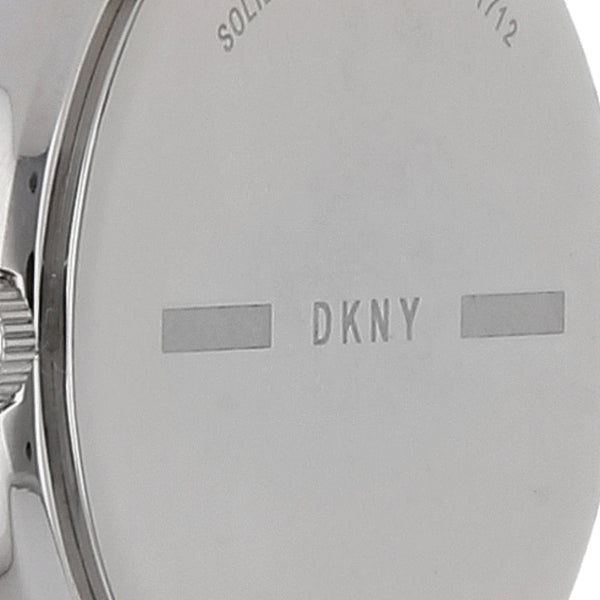 Reloj DKNY para dama en acero inoxidable.