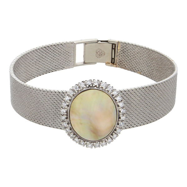 Pulsera eslabón tejido planchado con aplicación, madre perla y sintéticos en oro blanco 18 kilates.