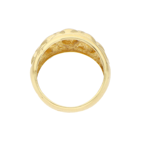 Anillo estilizado en oro amarillo 18 kilates.