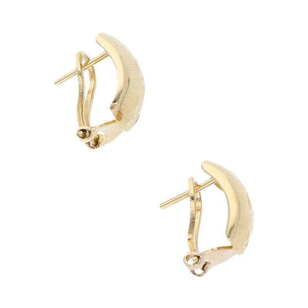 Aretes labrados en oro amarillo 14 kilates.