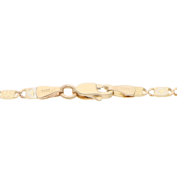 Pulsera eslabón combinado platinado en oro amarillo 14 kilates.