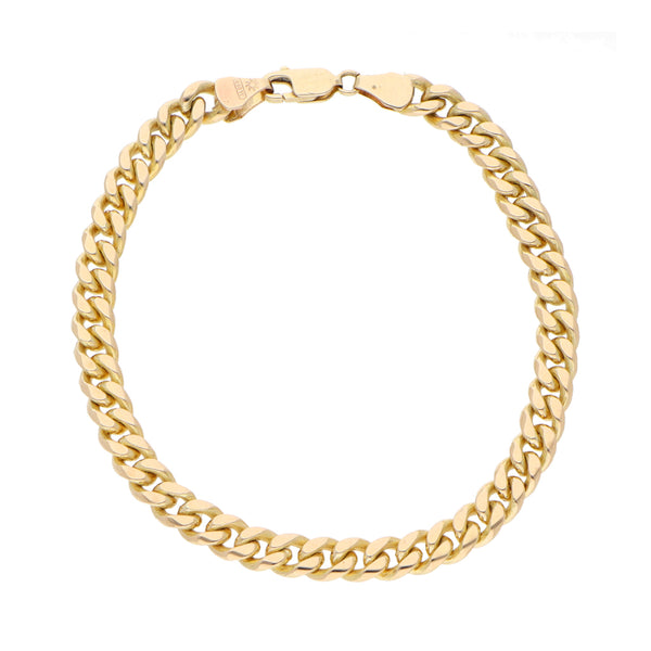 Pulsera eslabón barbado en oro amarillo 14 kilates.