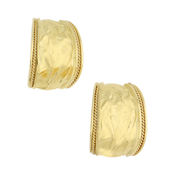 Aretes estilizados en oro amarillo 18 kilates.