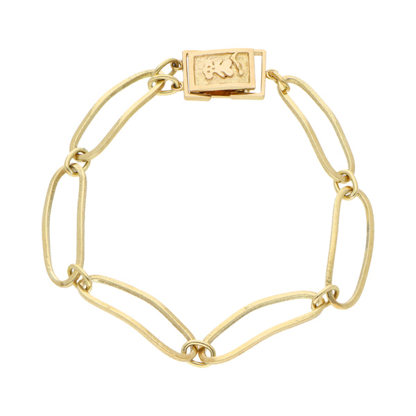 Pulsera eslabón combinado en oro amarillo 18 kilates.