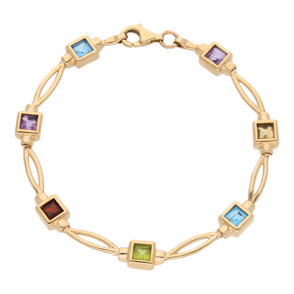 Pulsera eslabón combinado con sintéticos en oro amarillo 14 kilates.