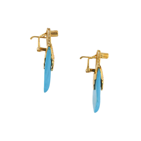 Aretes estilizados con diamantes y sintéticos en oro amarillo 14 kilates.