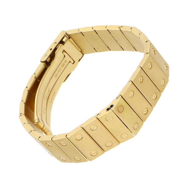 Pulsera eslabón articulado motivo tornillos simulados firma Cartier en oro amarillo 18 kilates.