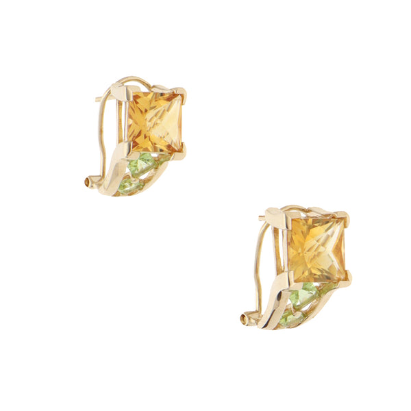 Aretes diseño especial con sintéticos en oro amarillo 14 kilates.