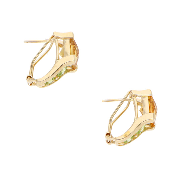 Aretes diseño especial con sintéticos en oro amarillo 14 kilates.