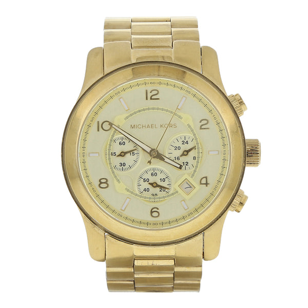 Reloj Michael Kors para caballero en acero chapa.