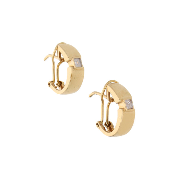 Aretes diseño especial con circonias en oro amarillo 14 kilates.