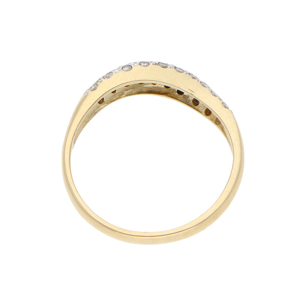 Anillo estilizado con diamantes en oro amarillo 14 kilates.