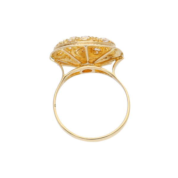 Anillo estilizado con circonias en oro amarillo 14 kilates.