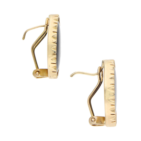 Aretes estilizados con venturinas en oro amarillo 14 kilates.