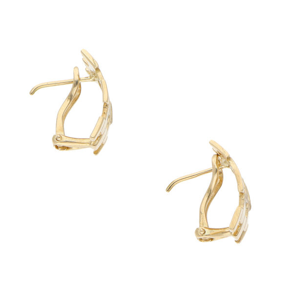 Aretes calados en oro amarillo 14 kilates.