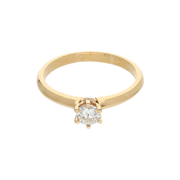 Anillo solitario con diamante en oro amarillo 14 kilates.