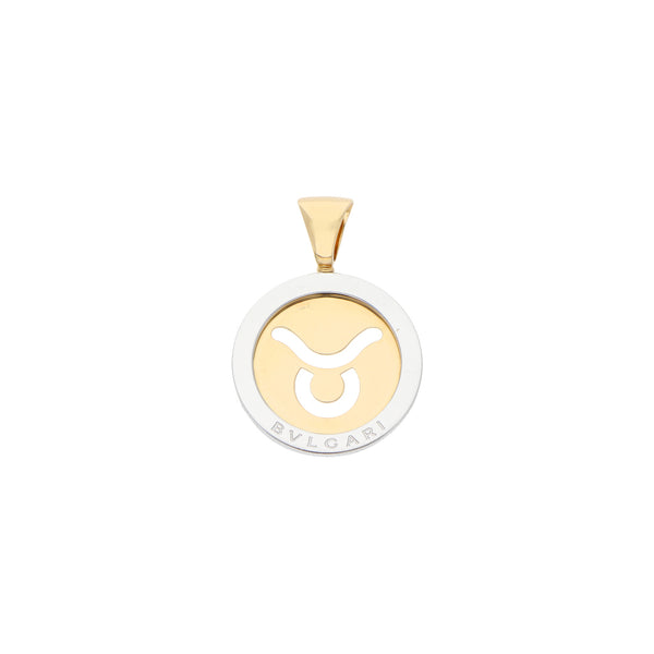 Dije calado firma Bvlgari en acero y oro amarillo 18 kilates.