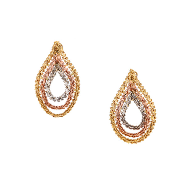 Aretes boleados en oro tres tonos 18 kilates.