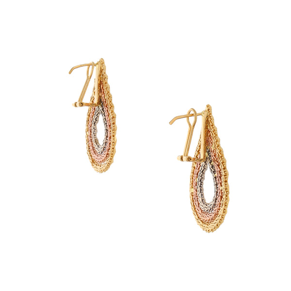 Aretes boleados en oro tres tonos 18 kilates.