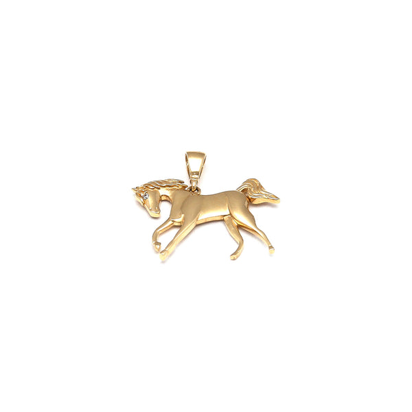 Dije diseño especial motivo caballo en oro amarillo14 kilates.