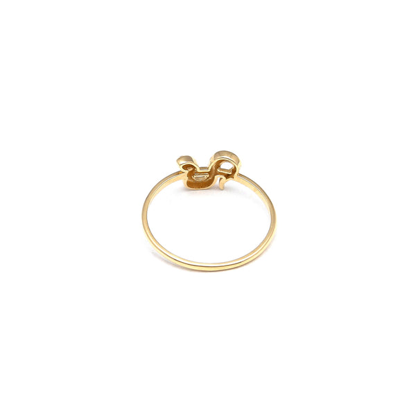 Anillo calado motivo serpiente en oro amarillo 14 kilates.