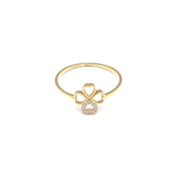 Anillo calado motivo trébol con circonias en oro amarillo 14 kilates.