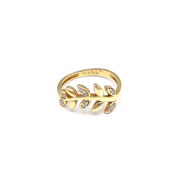 Anillo diseño especial motivo hojas con circonias en oro amarillo 14 kilates.