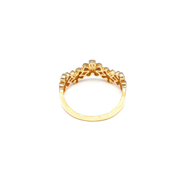 Anillo calado motivo floral en oro dos tonos 14 kilates.