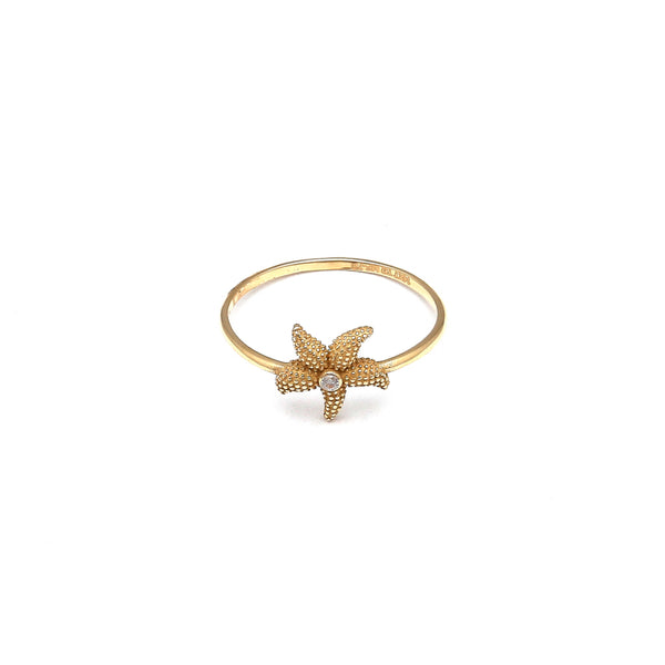 Anillo diseño especial motivo estrella de Mar con circonia en oro amarillo 14 kilates