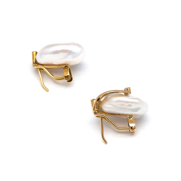 Aretes diseño especial con perlas barrocas y circonias en oro amarillo 14 kilates.