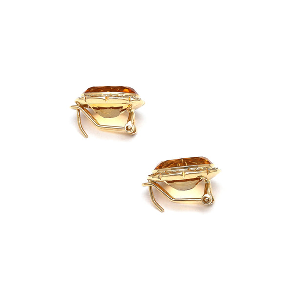 Aretes diseño especial con citrinos en oro amarillo 14 kilates.