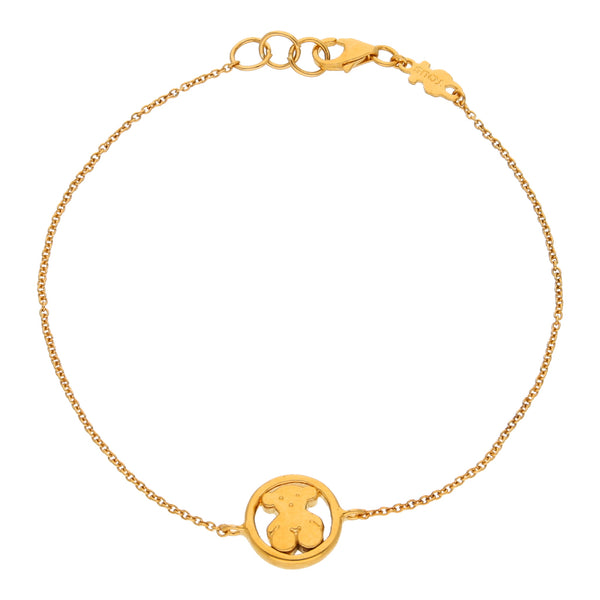 Pulsera eslabón cruzado firma Tous con aplicación motivo oso en oro amarillo 18 kilates.