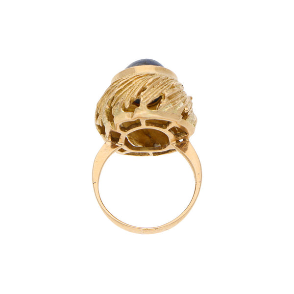 Anillo diseño especial con sodalita en oro amarillo 18 kilates.