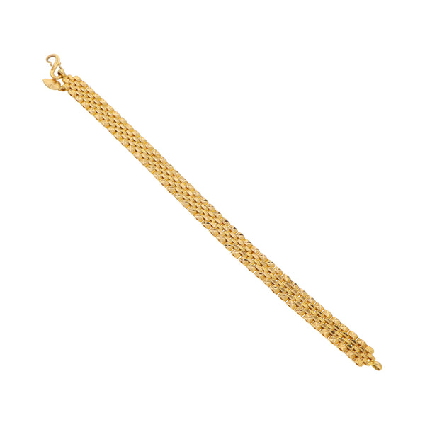 Pulsera eslabón articulado combinado con colgante motivo corazón en oro amarillo 22 kilates.