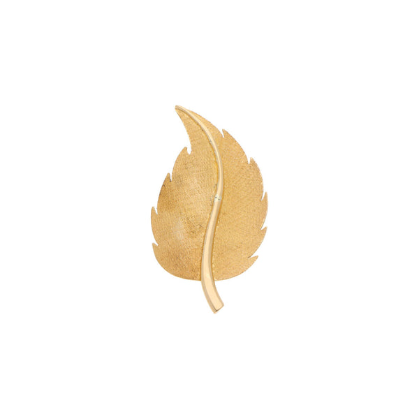 Prendedor diseño especial motivo hoja en oro amarillo 18 kilates.