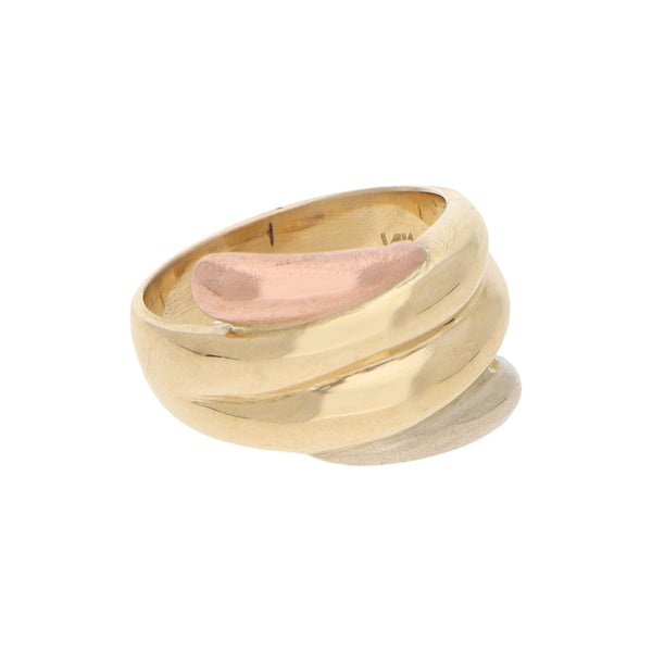 Anillo estilizado en oro tres tonos 14 kilates.