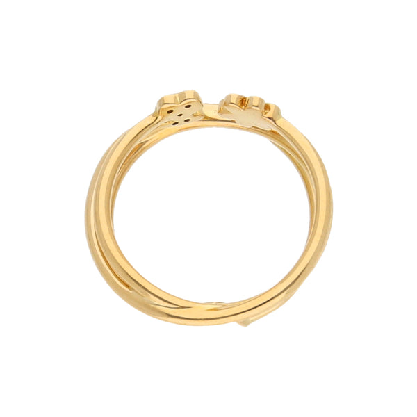 Anillo diseño especial motivo oso, floral y corazón con diamantes firma Tous en oro amarillo 18 kilates.