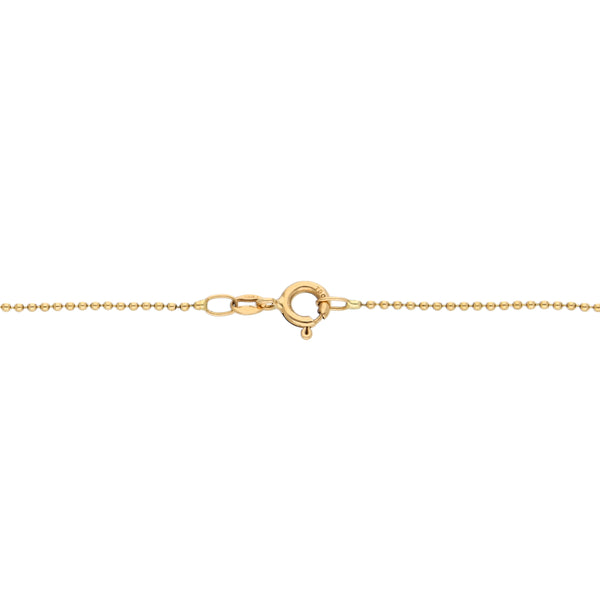 Pulsera eslabón boleado con esferas y colgante motivo corazón en oro amarillo y arracadas tubulares en oro rosa 18 kilates.