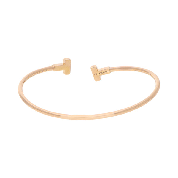 Pulsera abierta firma Tiffany & Co en oro rosa 18 kilates.