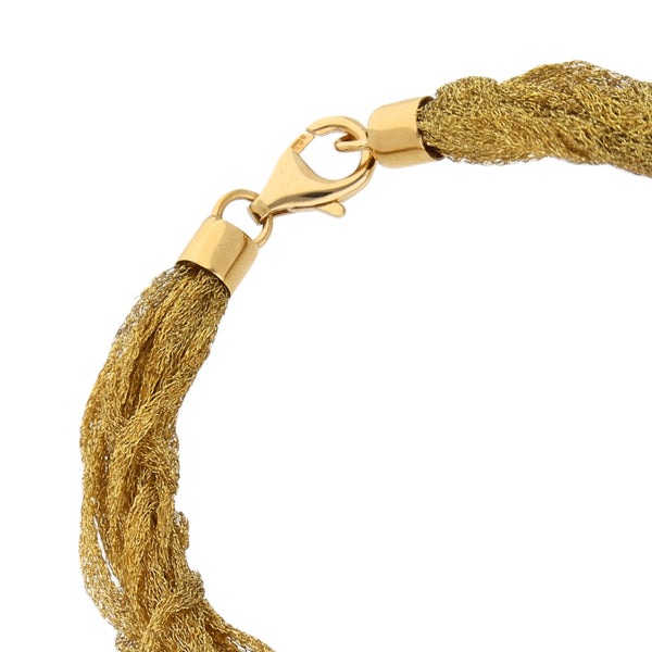 Pulsera eslabón tejido en oro amarillo 18 kilates.