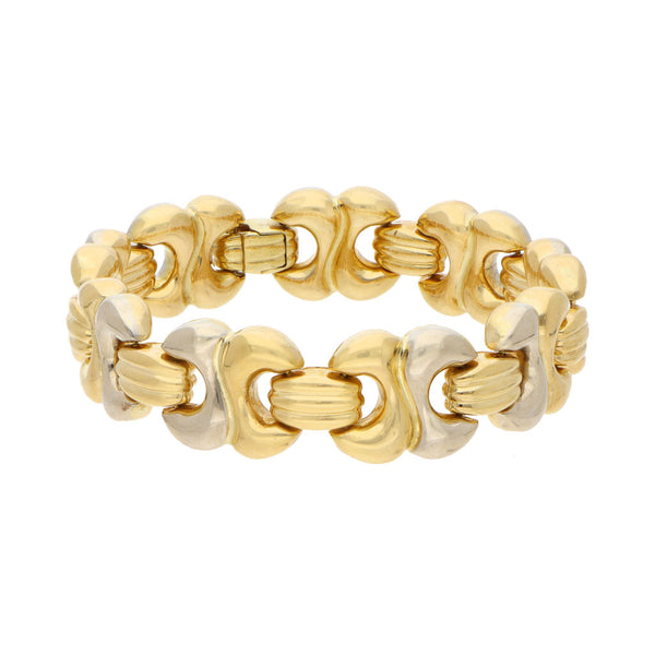 Pulsera eslabón combinado en oro amarillo 18 kilates.