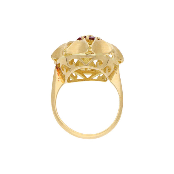 Anillo calado con rubíes en oro amarillo 18 kilates.