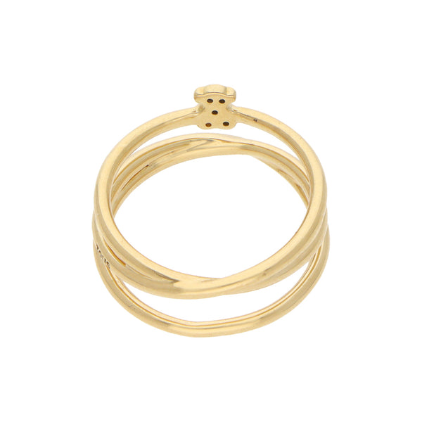 Anillo diseño especial firma Tous con aplicación motivo oso y diamantes en oro amarillo 18 kilates.