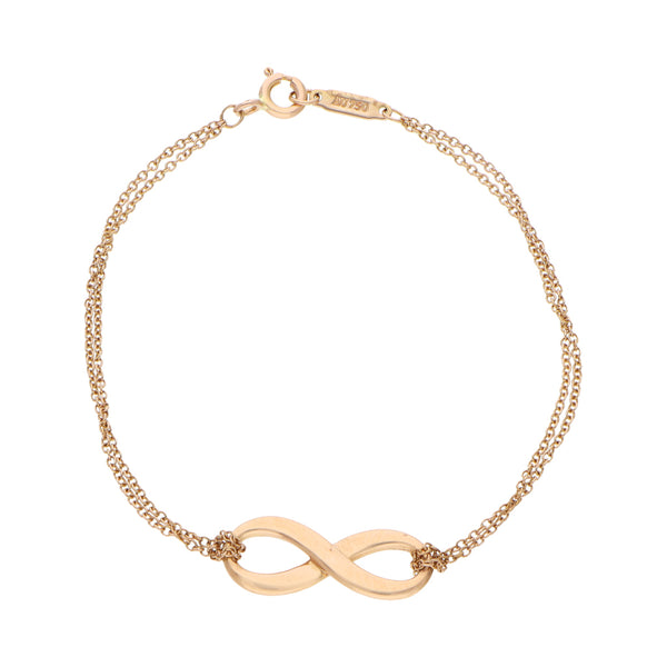 Pulsera dos hilos eslabón cruzado con aplicación motivo infinito firma Tiffany & Co. en oro rosa 18 kilates.