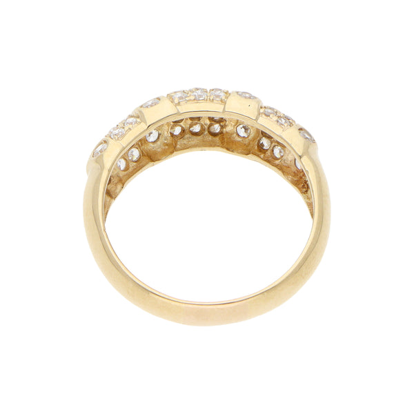 Anillo estilizado con circonias en oro amarillo 14 kilates